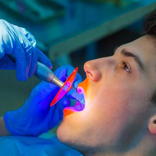 Dental patient undergoing direct bonding treatment