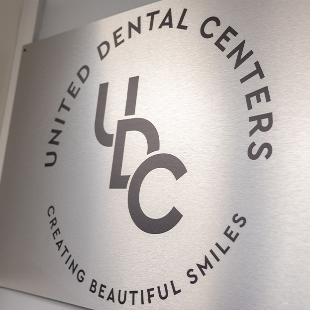 Sign that says United Dental Centers Creating Beautiful Smiles