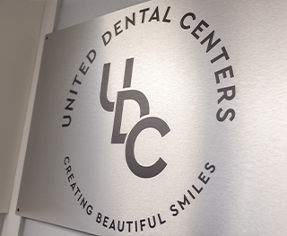 Sign that says United Dental Centers Creating Beautiful Smiles